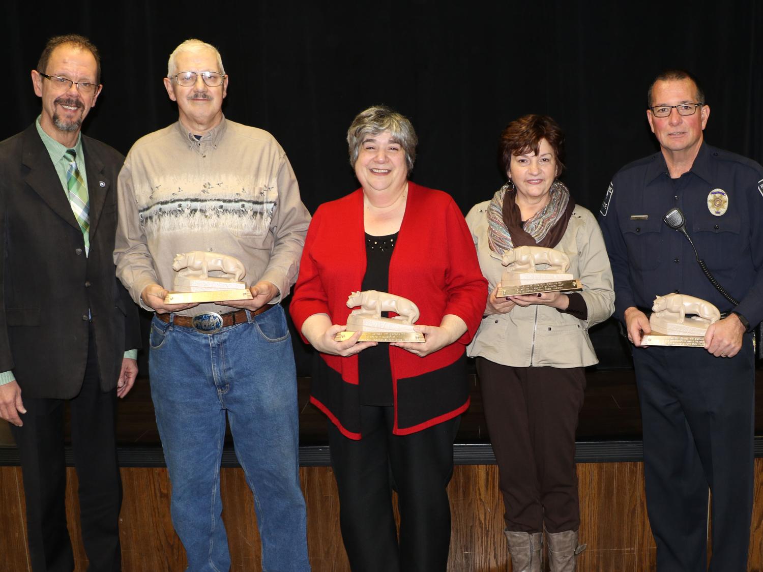Penn State Hazleton recognized four longtime employees who are retiring at the end of 2016. From left: Chancellor Gary Lawler, Matthew “Gene” Broyan, Sue Ann Cervasio, Donna Ellis and Michael Conway.