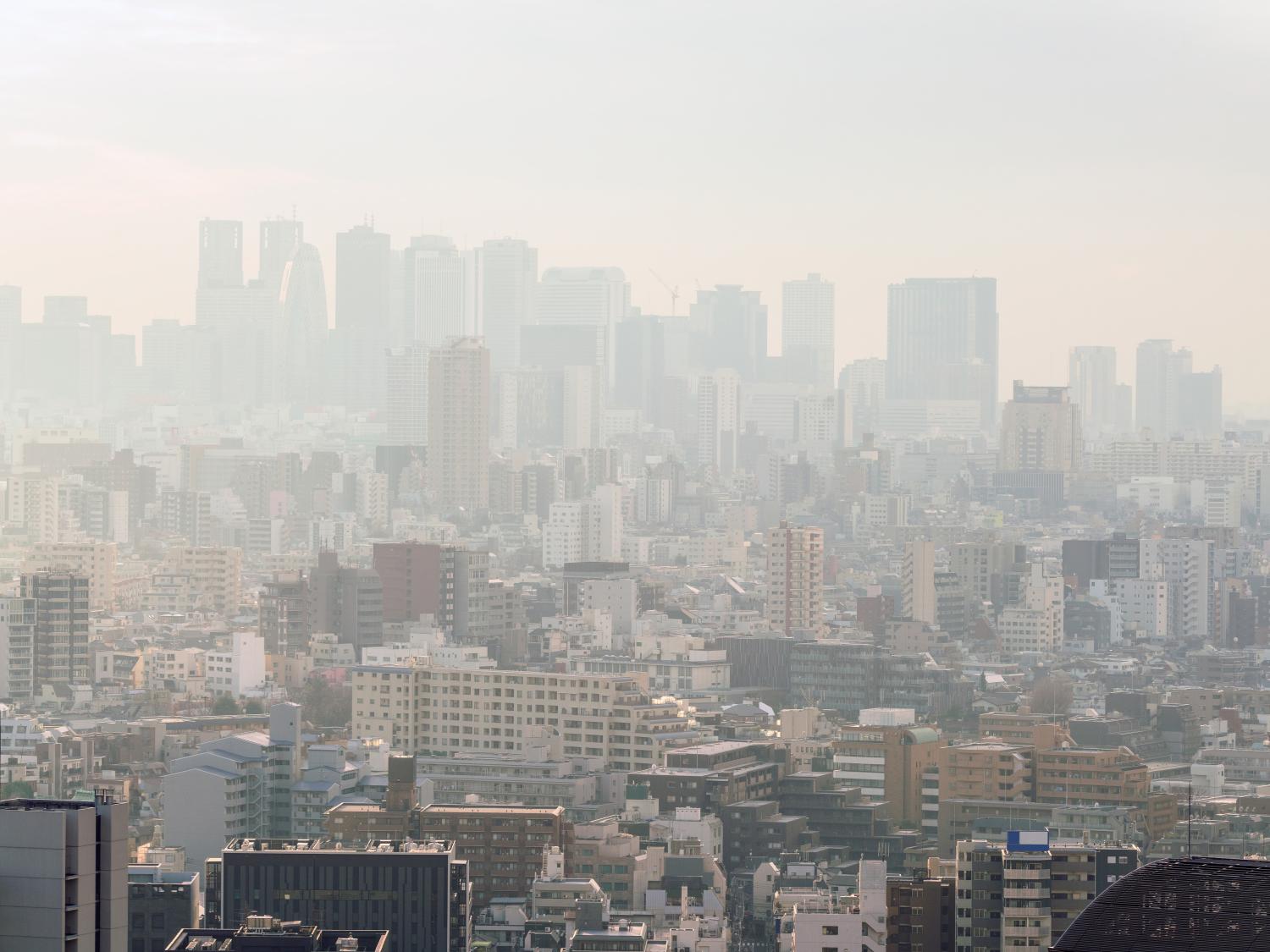 Air pollution haze across a cityscape