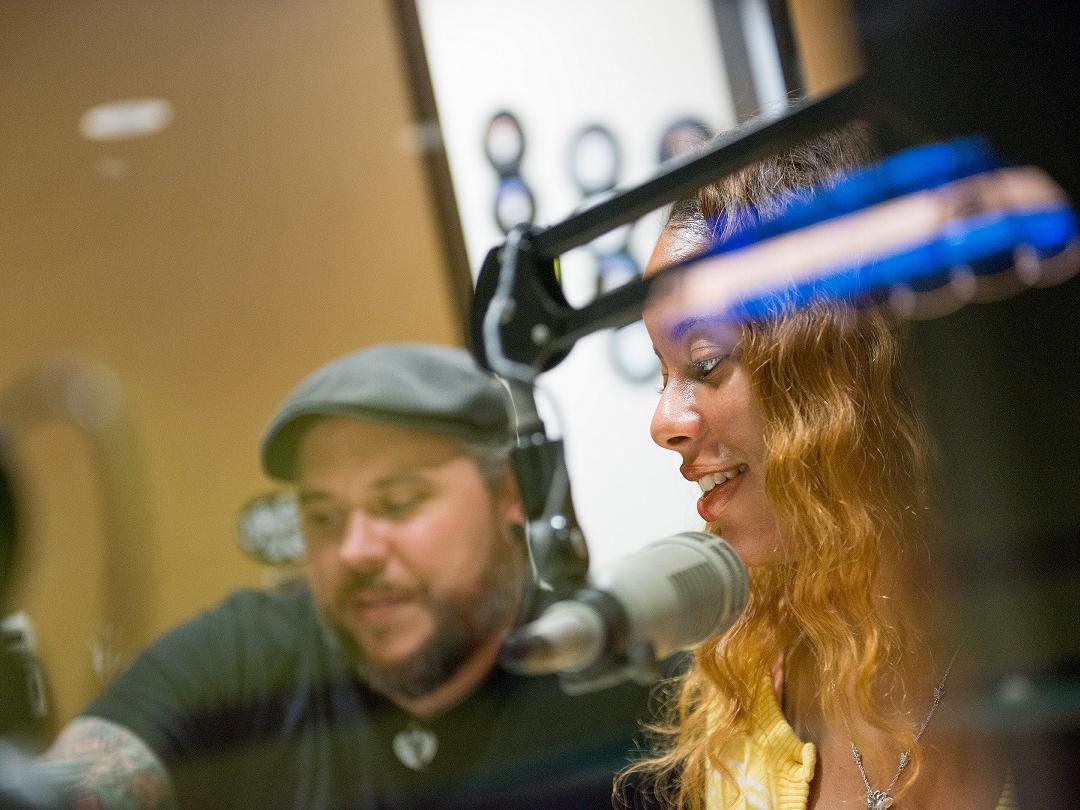 man at radio station