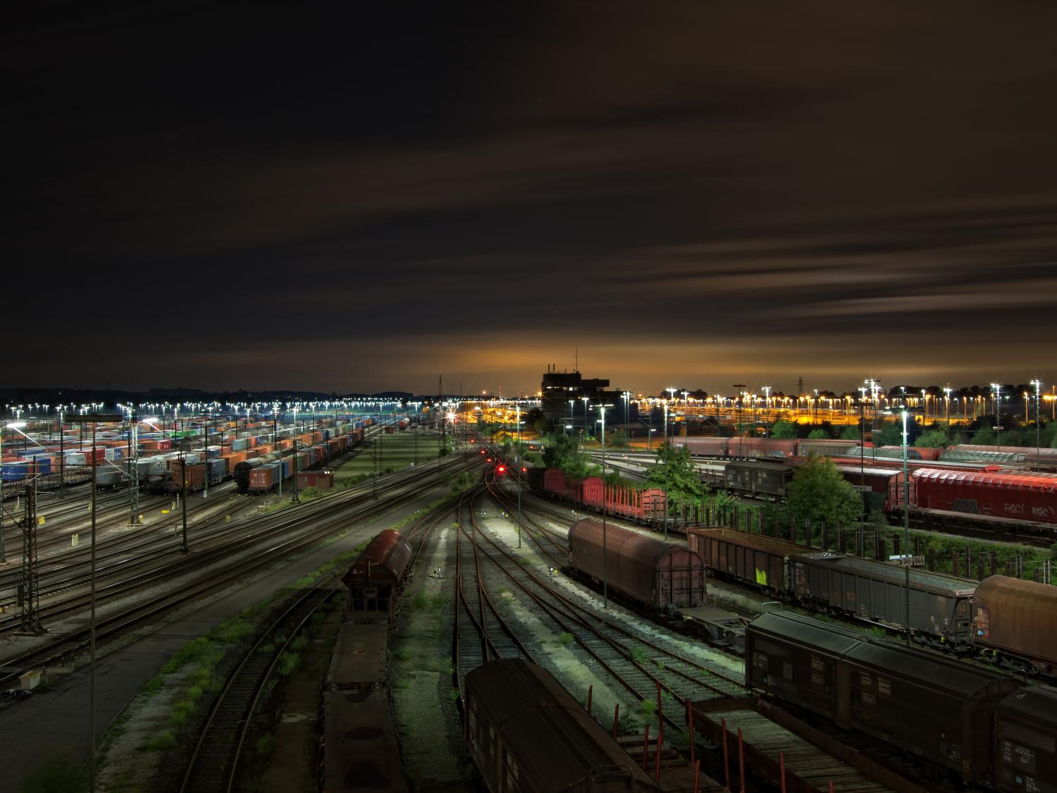 Rail yard full of trains on tracks