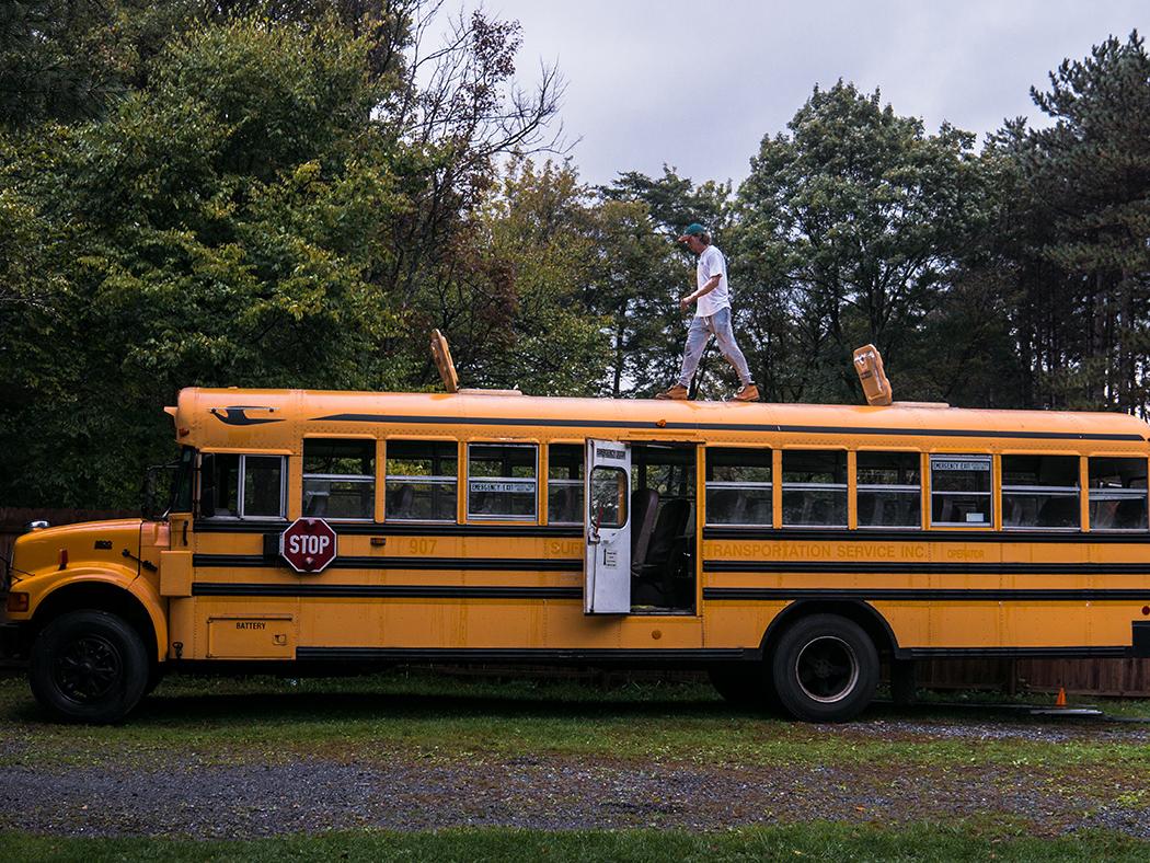 Sam Reiser atop bus