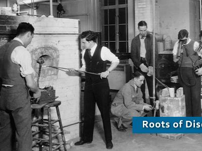 historical photo of men manipulating glass in workshop