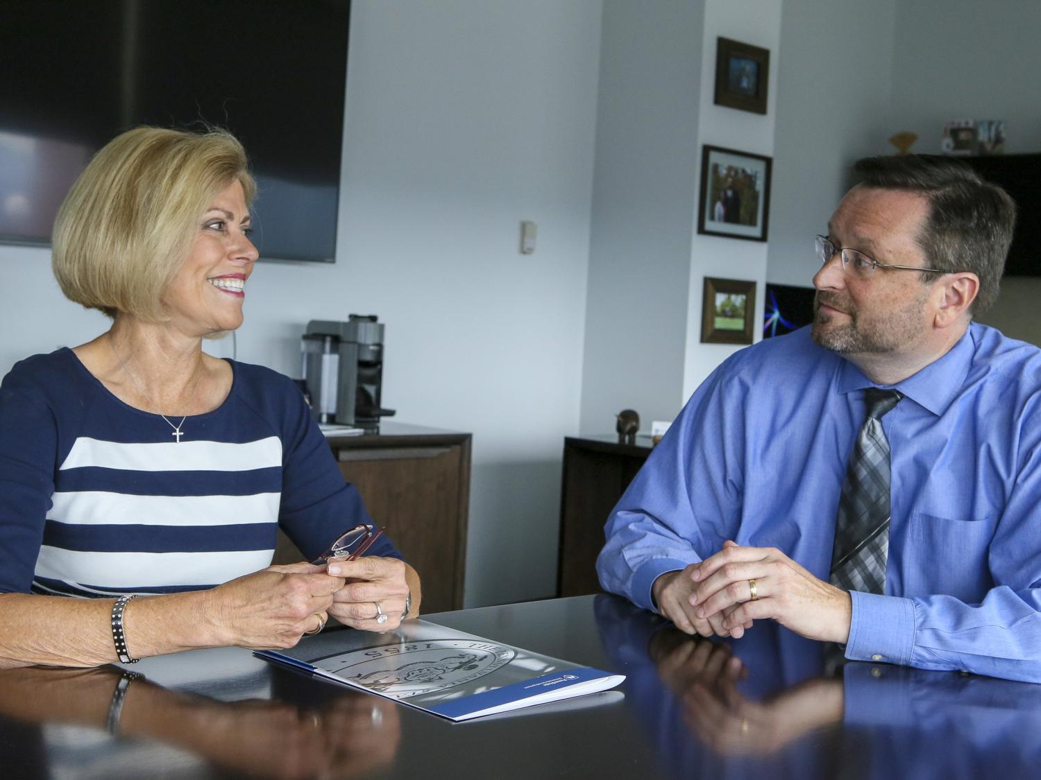 Diana L. Tronzo, who has endowed the professorship, with Dean Andrew Sears. 