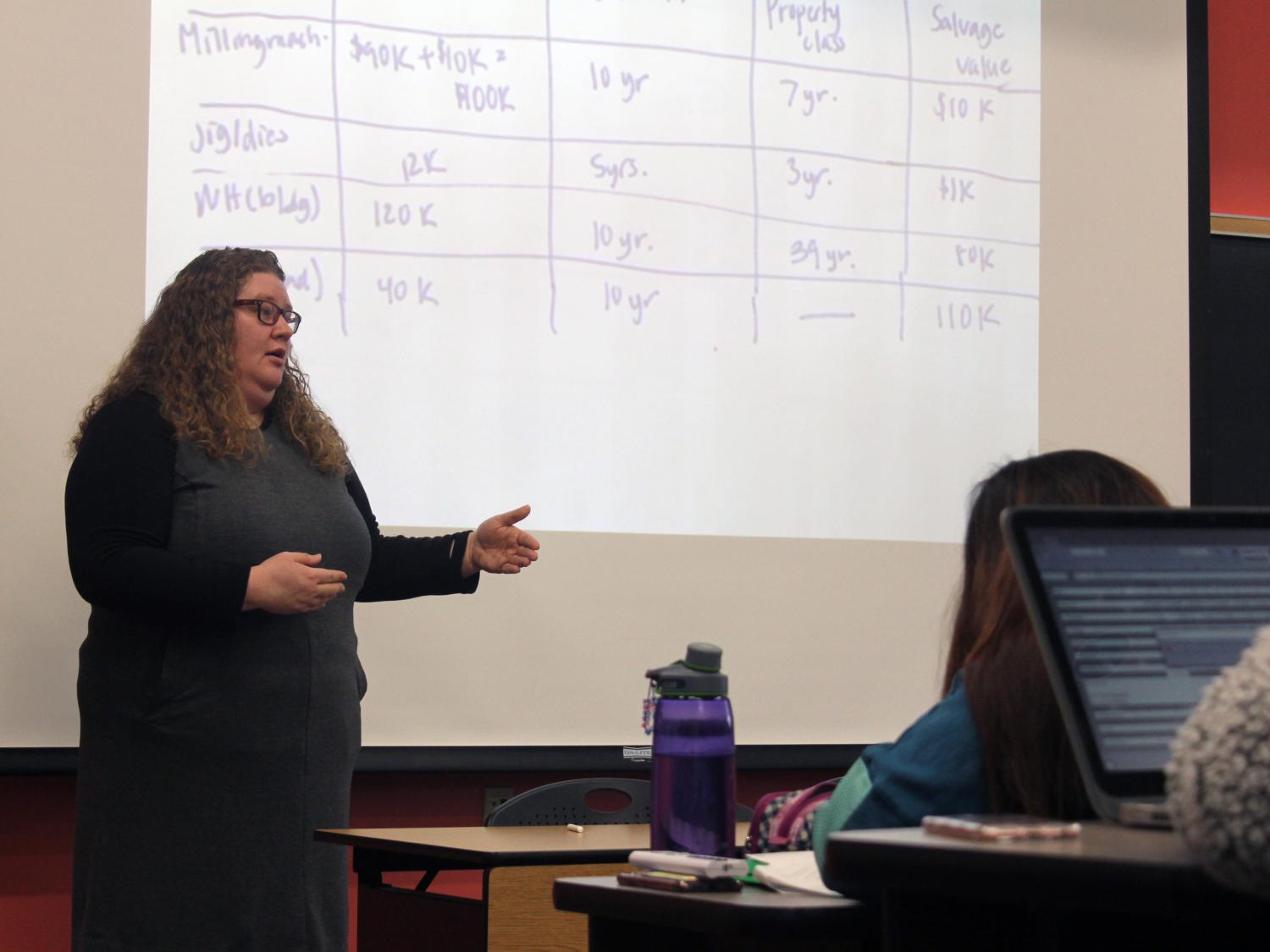 Sarah Root teaching an industrial engineering course