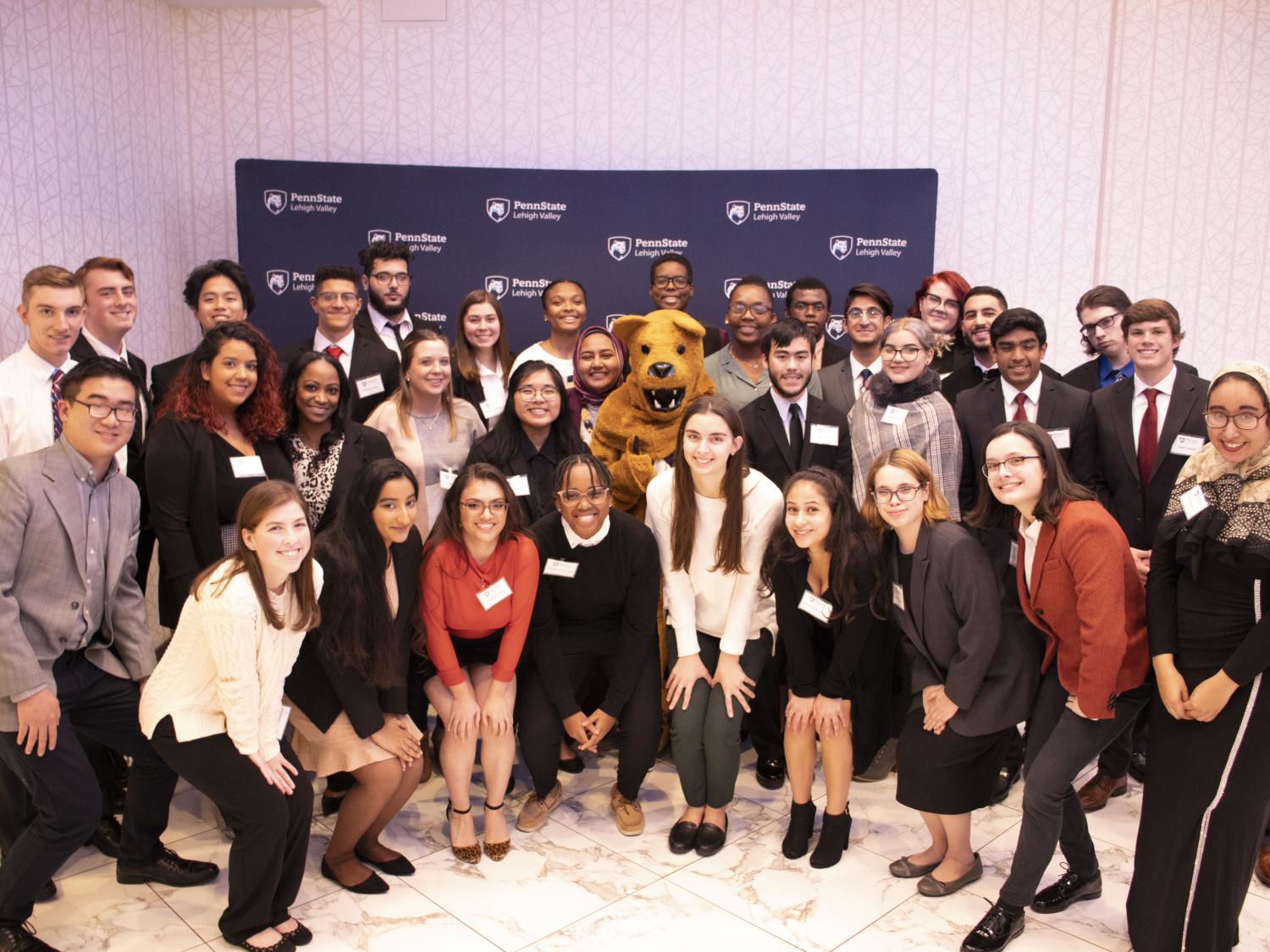 group of students with nittany lion mascot