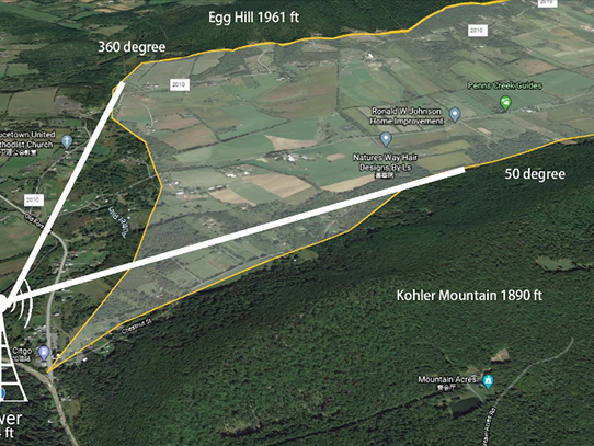 Google Earth illustration of a valley that includes a transmission tower icon and distance measurement information 