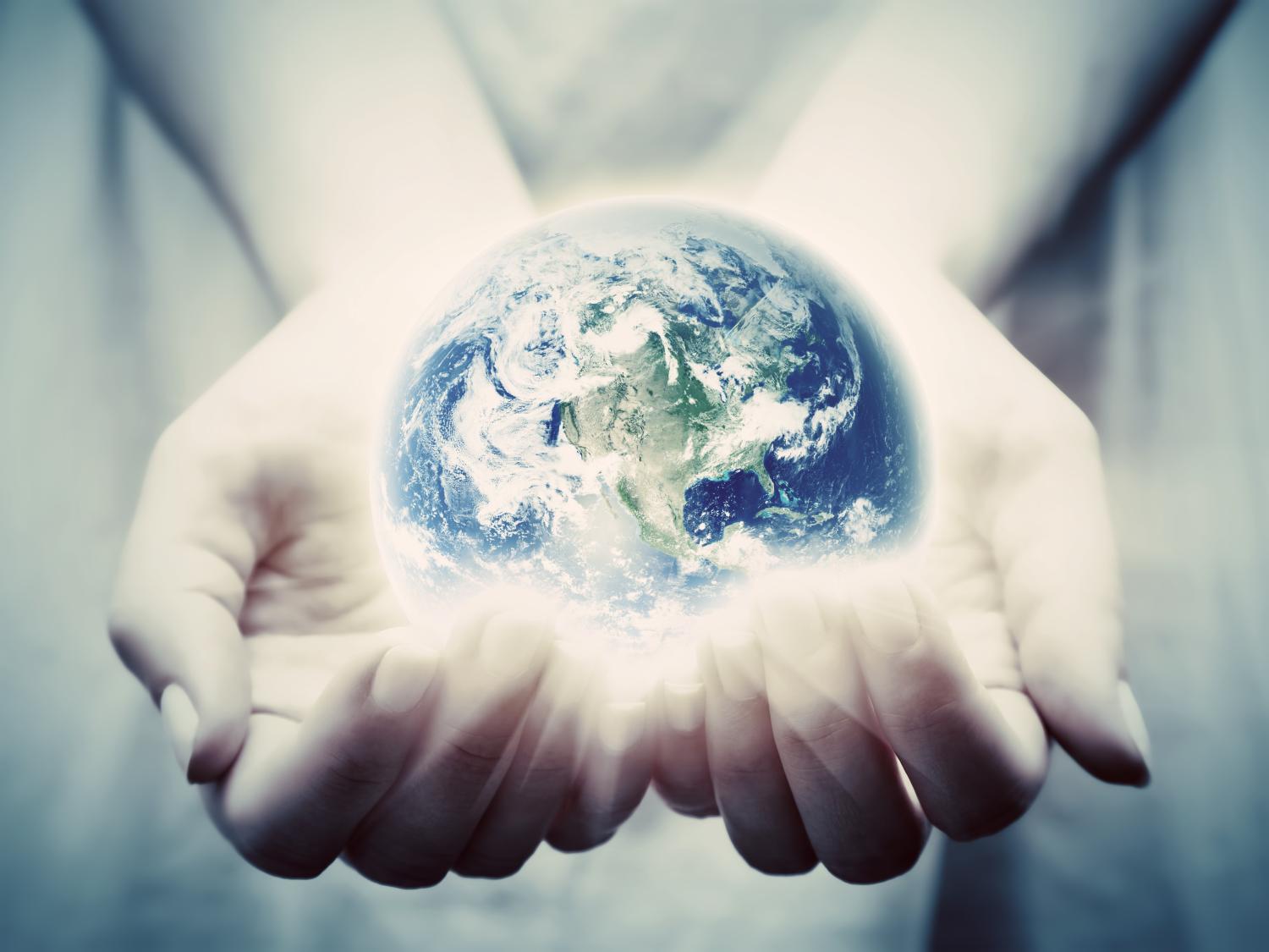 Hands holding the Earth