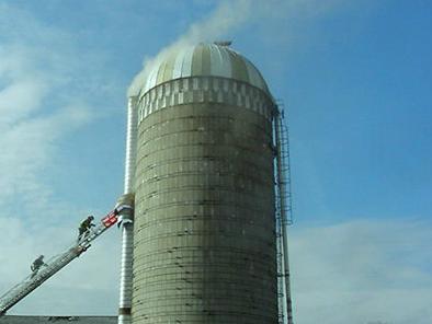 silo, smoke sky photo
