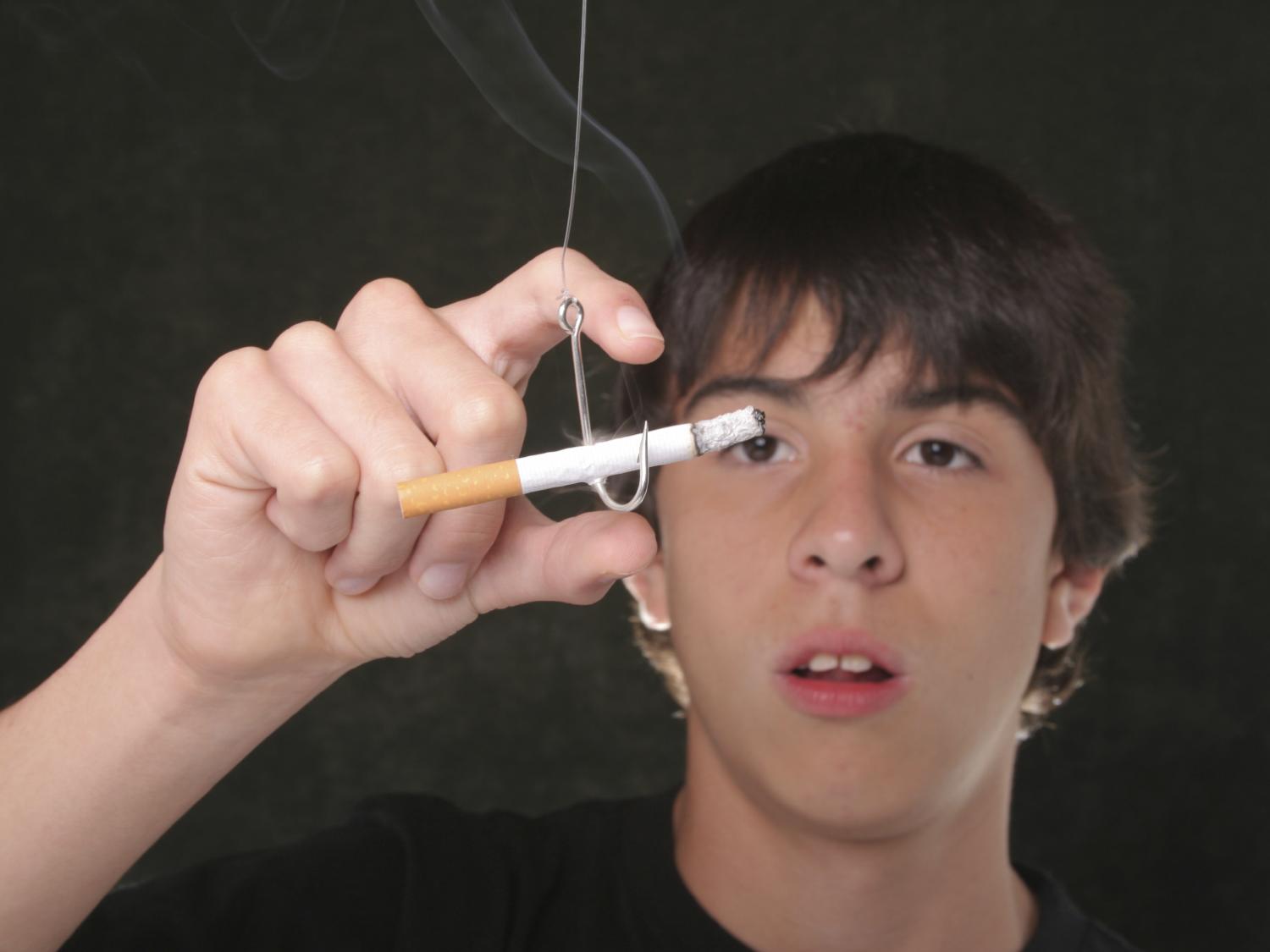 teen male and cigarette on fishing hook