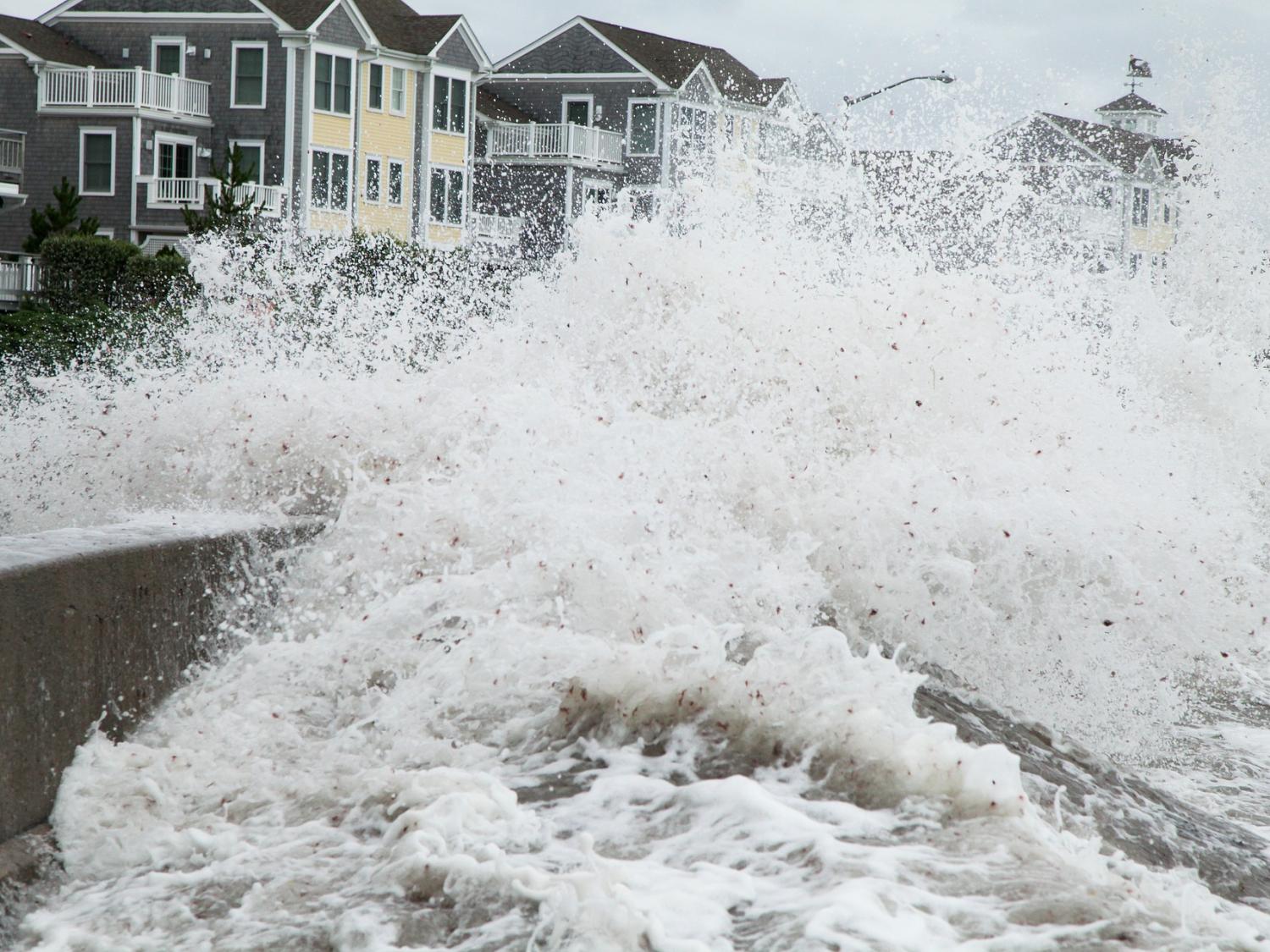 Storm surge batters a coastal area.