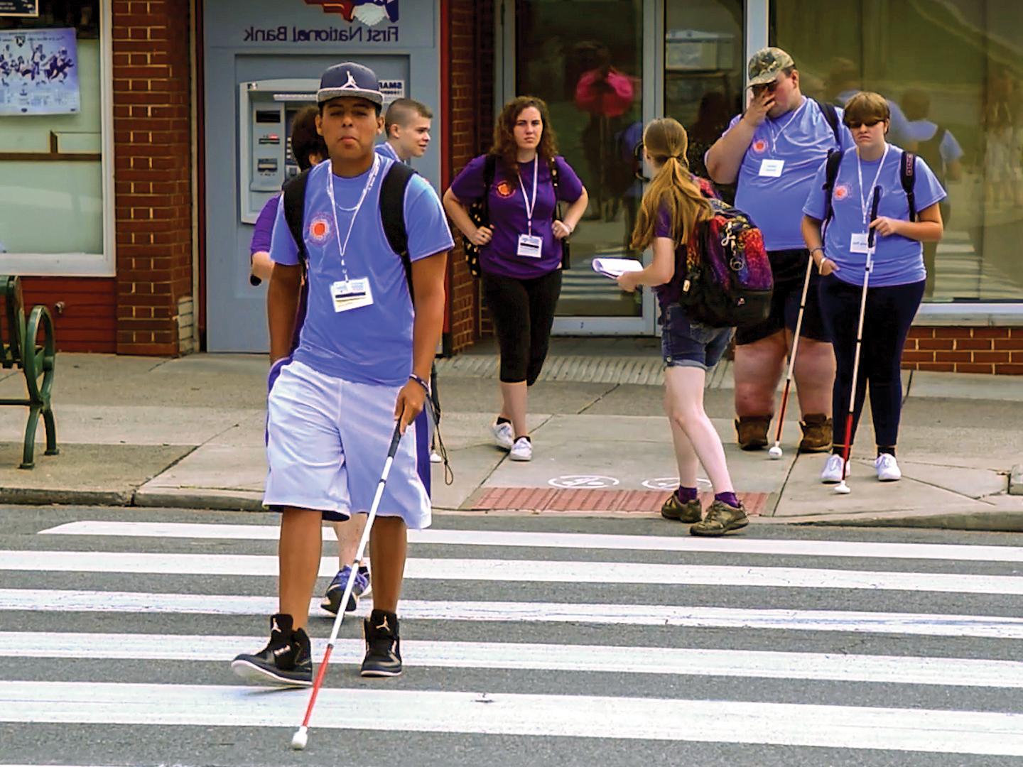 Students in the Summer Academy navigating a crosswalk.