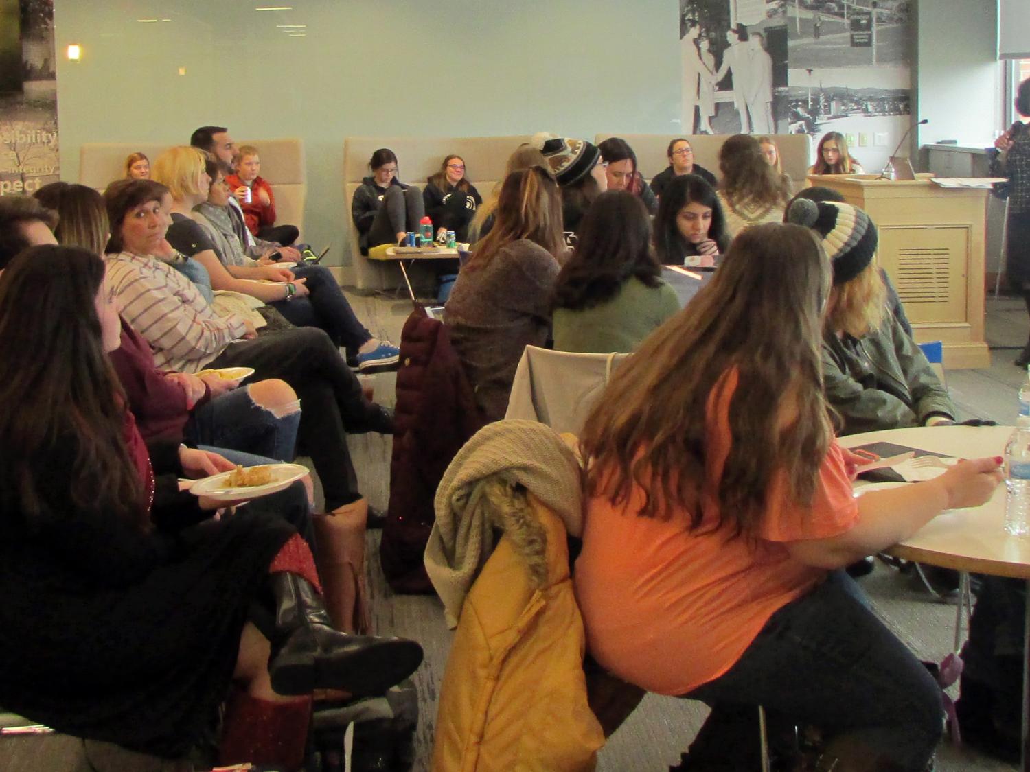 Dr. Sinha speaking to students
