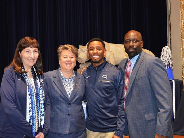 Penn State administrators pose for a picture at the Shenango Alumni Society Tailgate event on April 12
