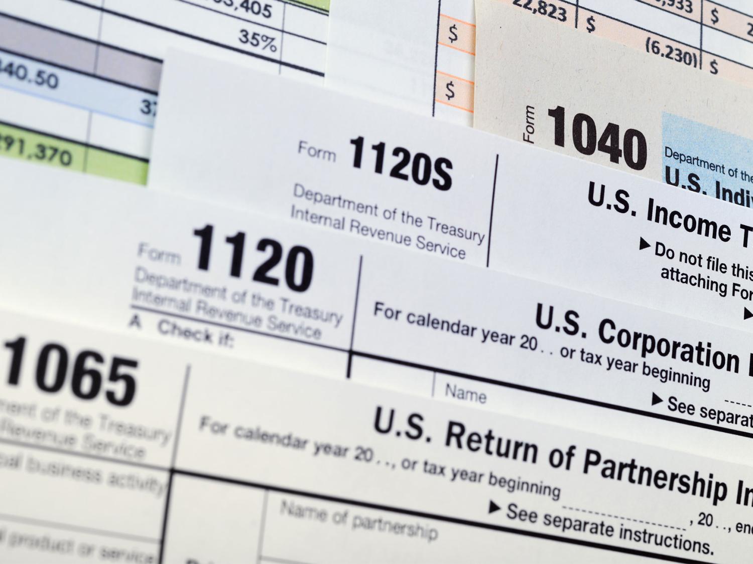 Tax forms are shown