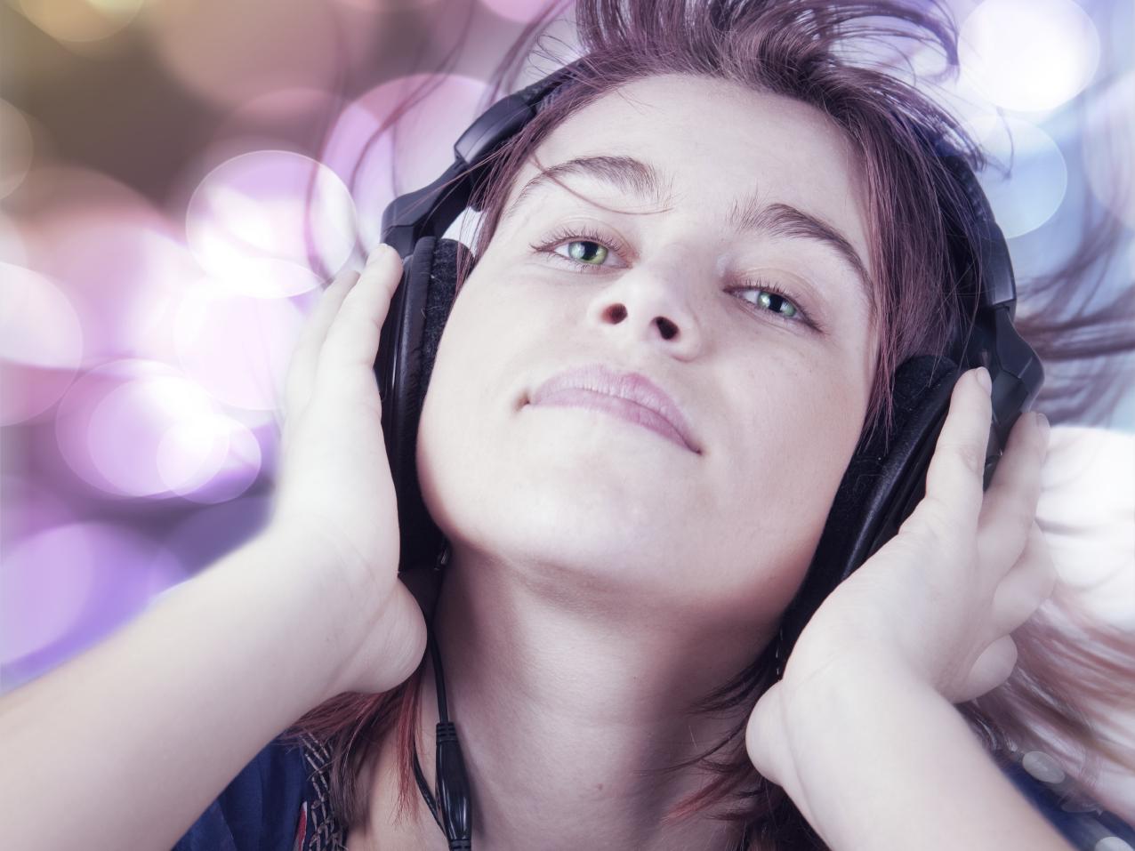 teen female wearing headphones