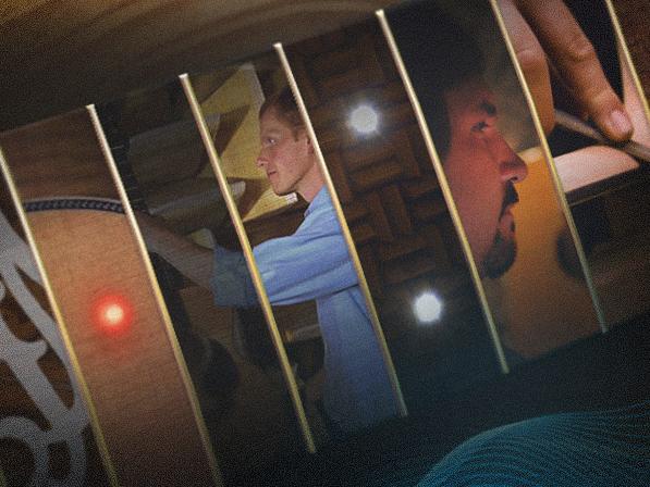 Images inside a guitar neck.