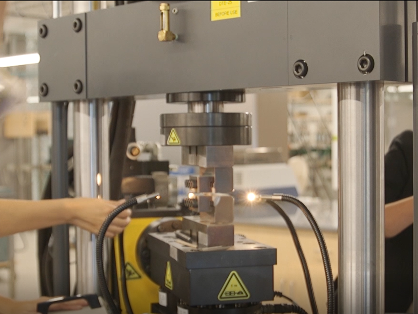 A image of two researchers working in a lab. 