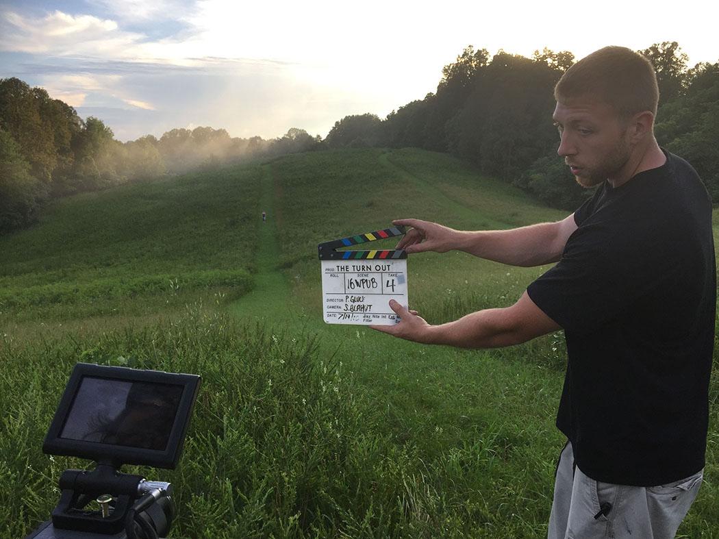 Film-video major Jon Barden, who graduated in December, starts a shooting session for "The Turn Out."