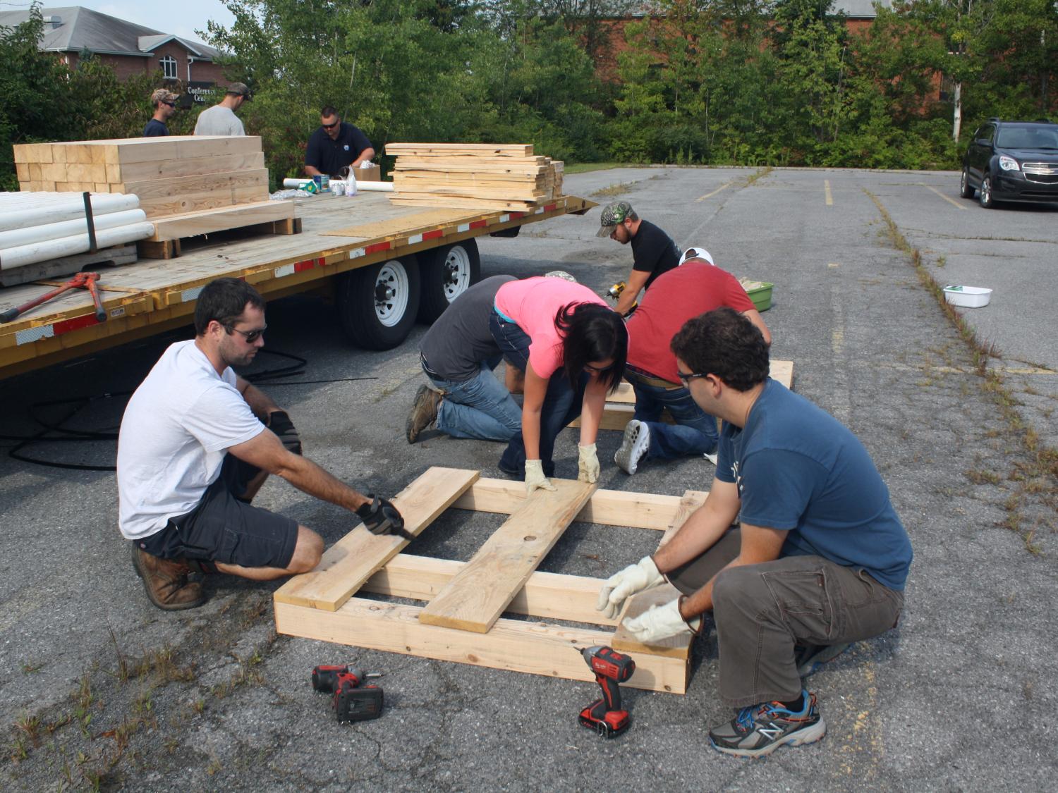 Students work to build basking platforms 