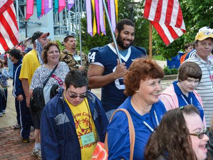 Football's John Urschel participates in the opening ceremonies of the 2012 Special Olympics Summer Games