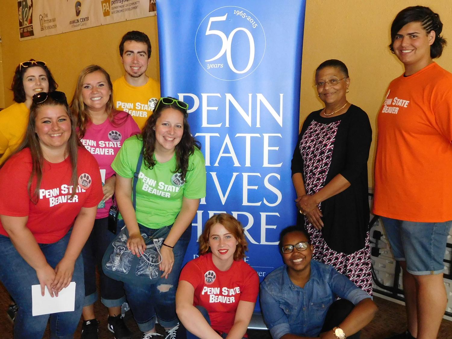 Penn State Beaver students take a break from volunteering to pose with the Franklin Center's Valerie McElvy.
