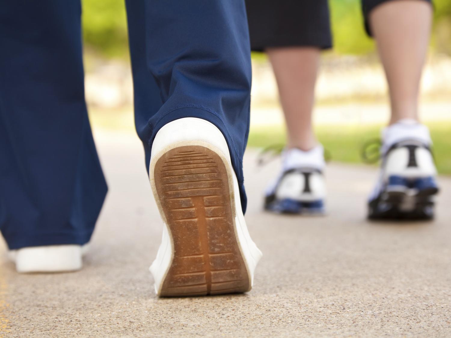 2 pair of feet walking