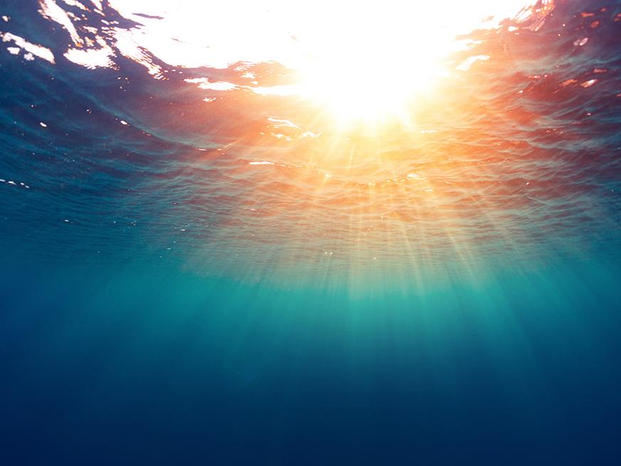 sun shining through water