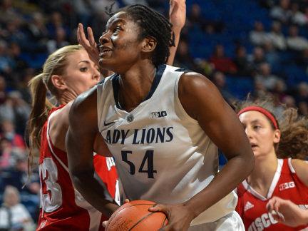 Lady Lion Nikki Greene makes a move to the basket