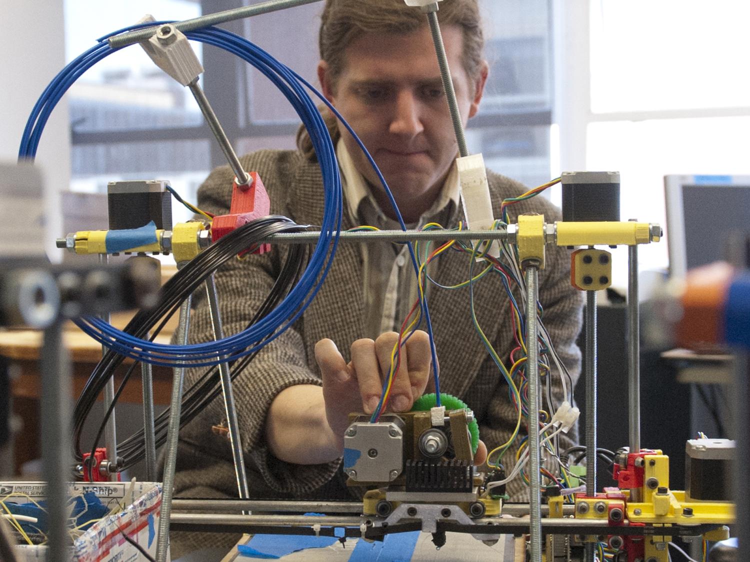 David Saint John with 3-D printer