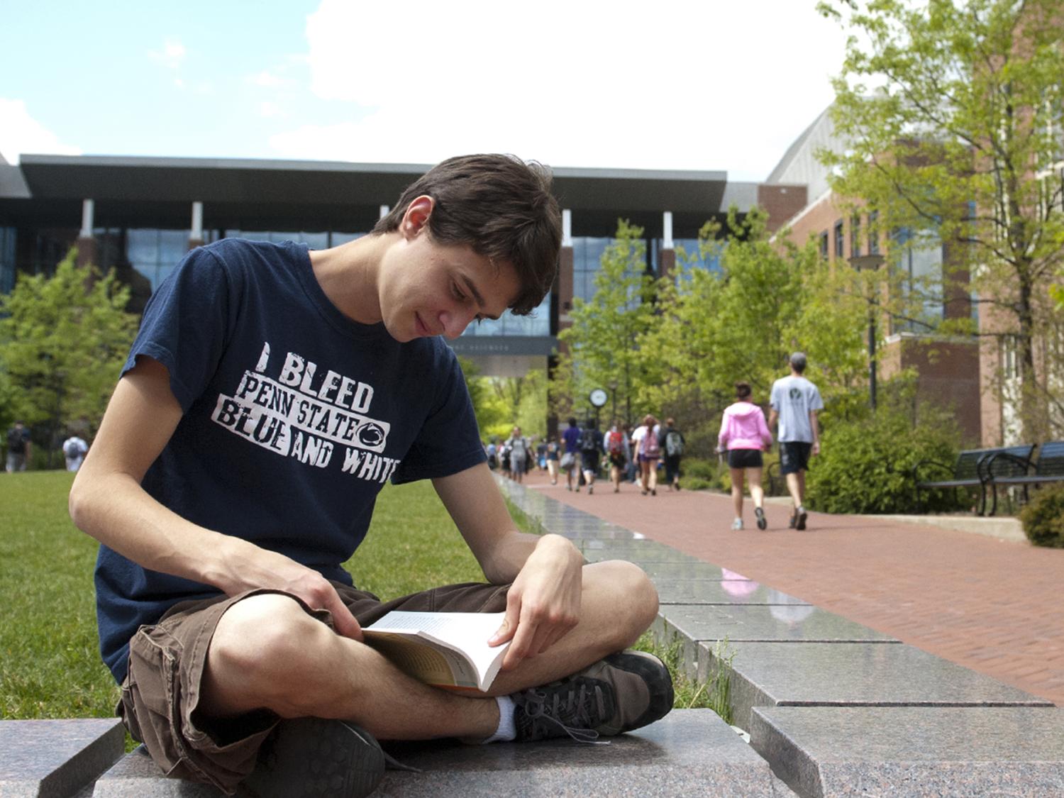 Student studying at Life Sciences Quad U.P.