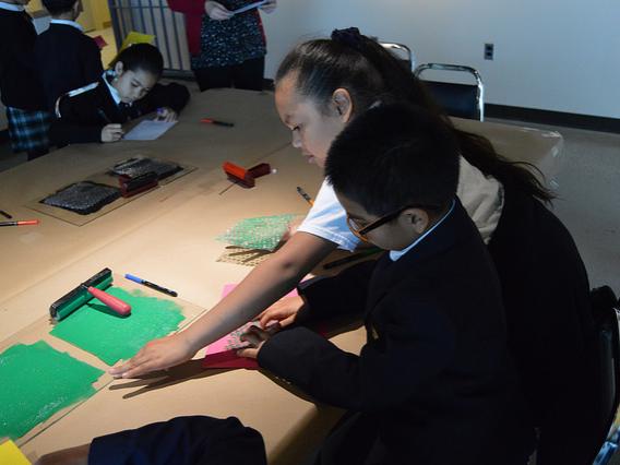 students work on art project