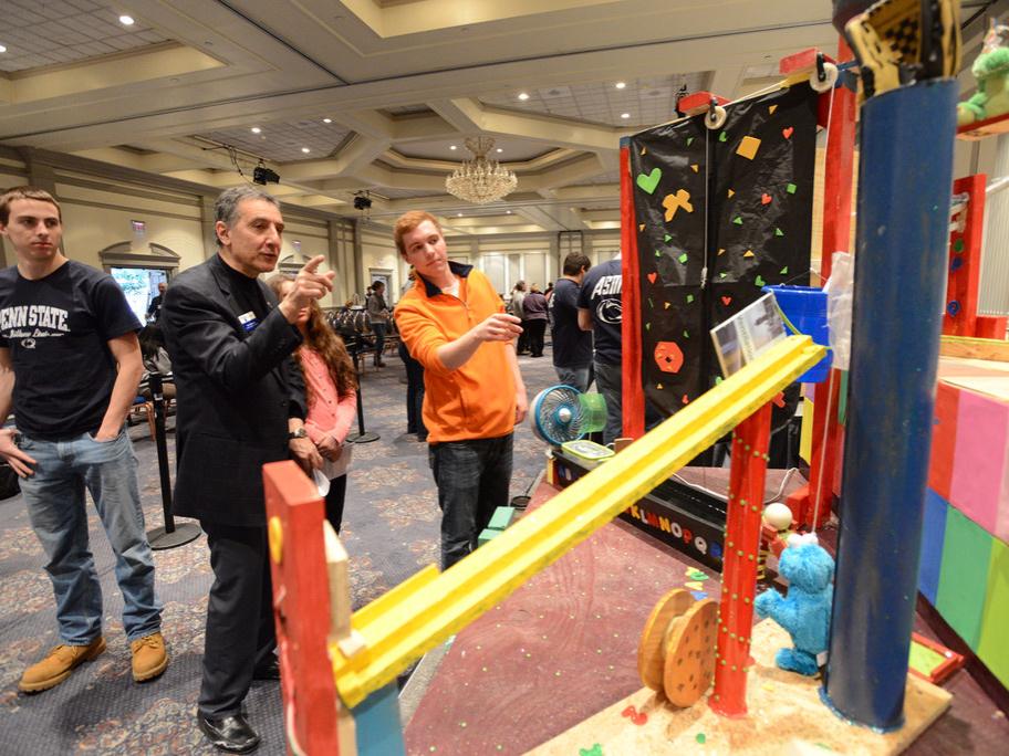 Dean views Rube Goldberg Machine