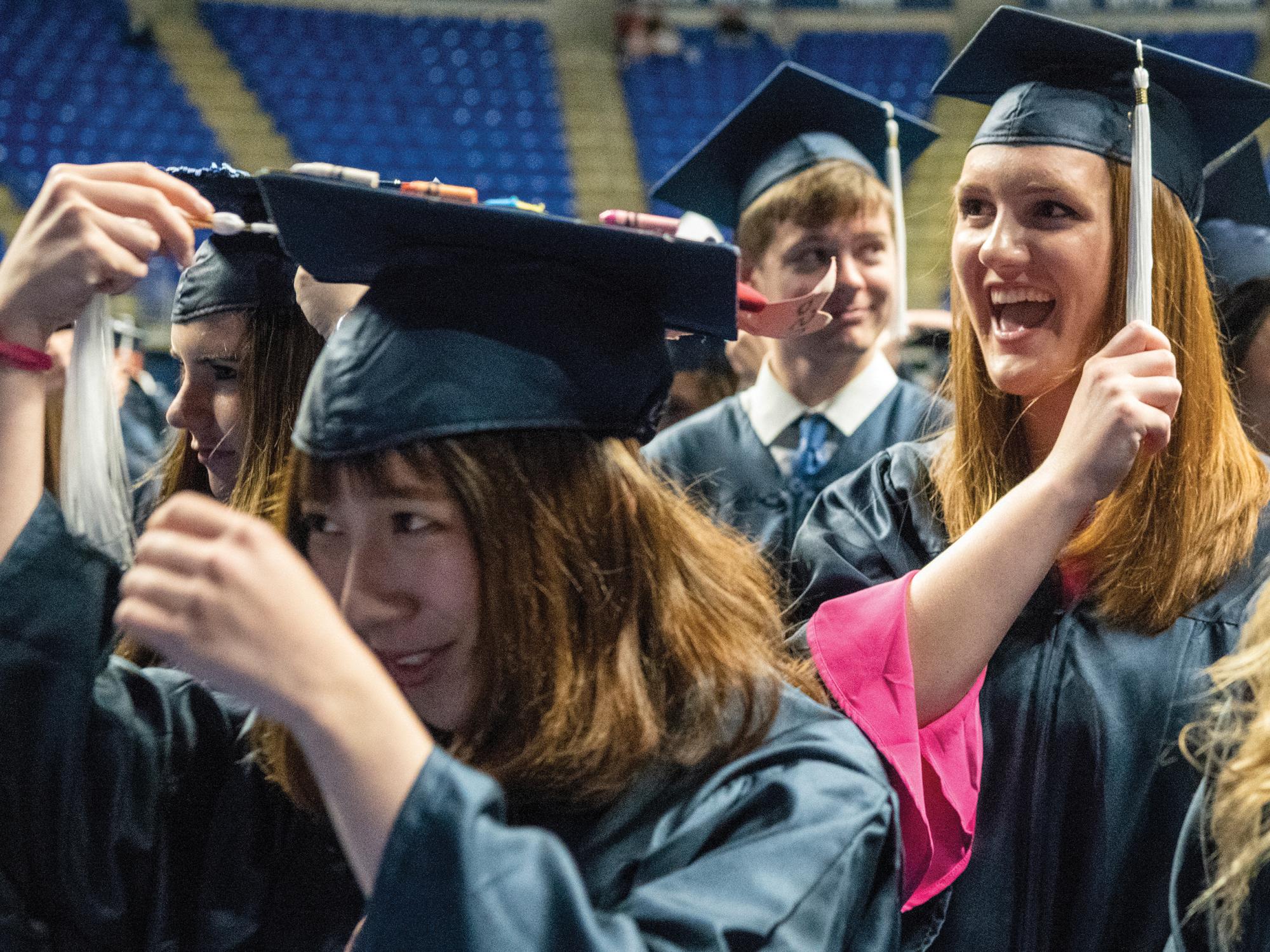 Graduates turning tassels