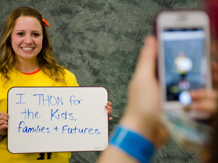 A student poses for a photo 