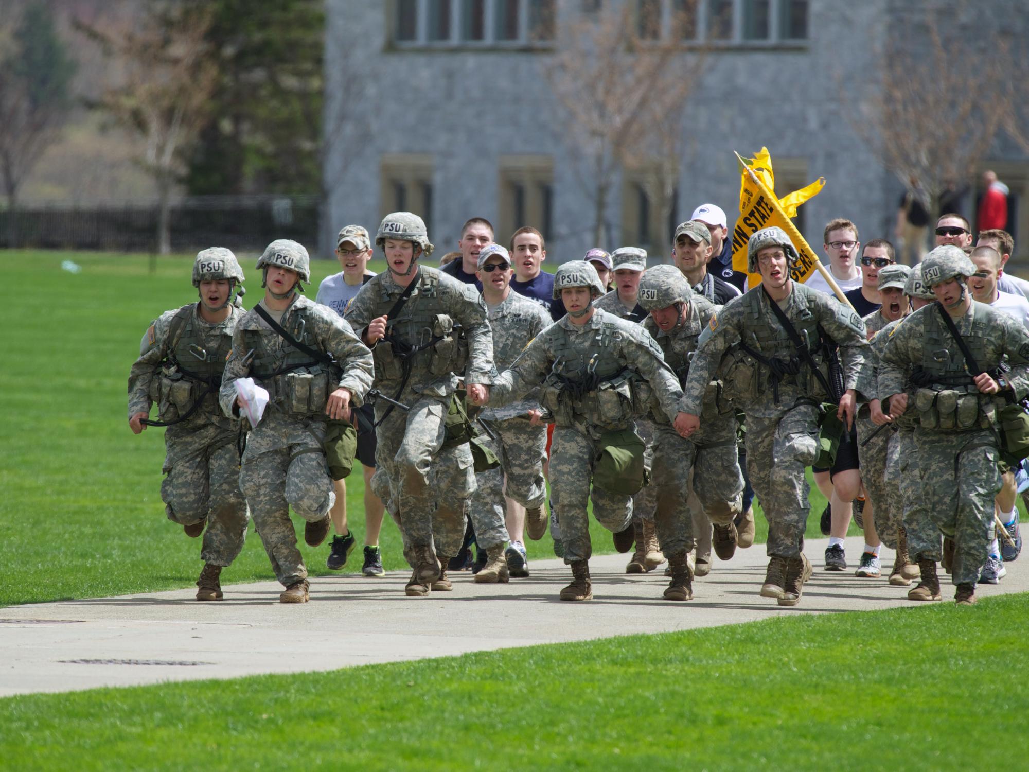 The Penn State Army ROTC Ranger Challenge Team's supporters cheering them on from behind