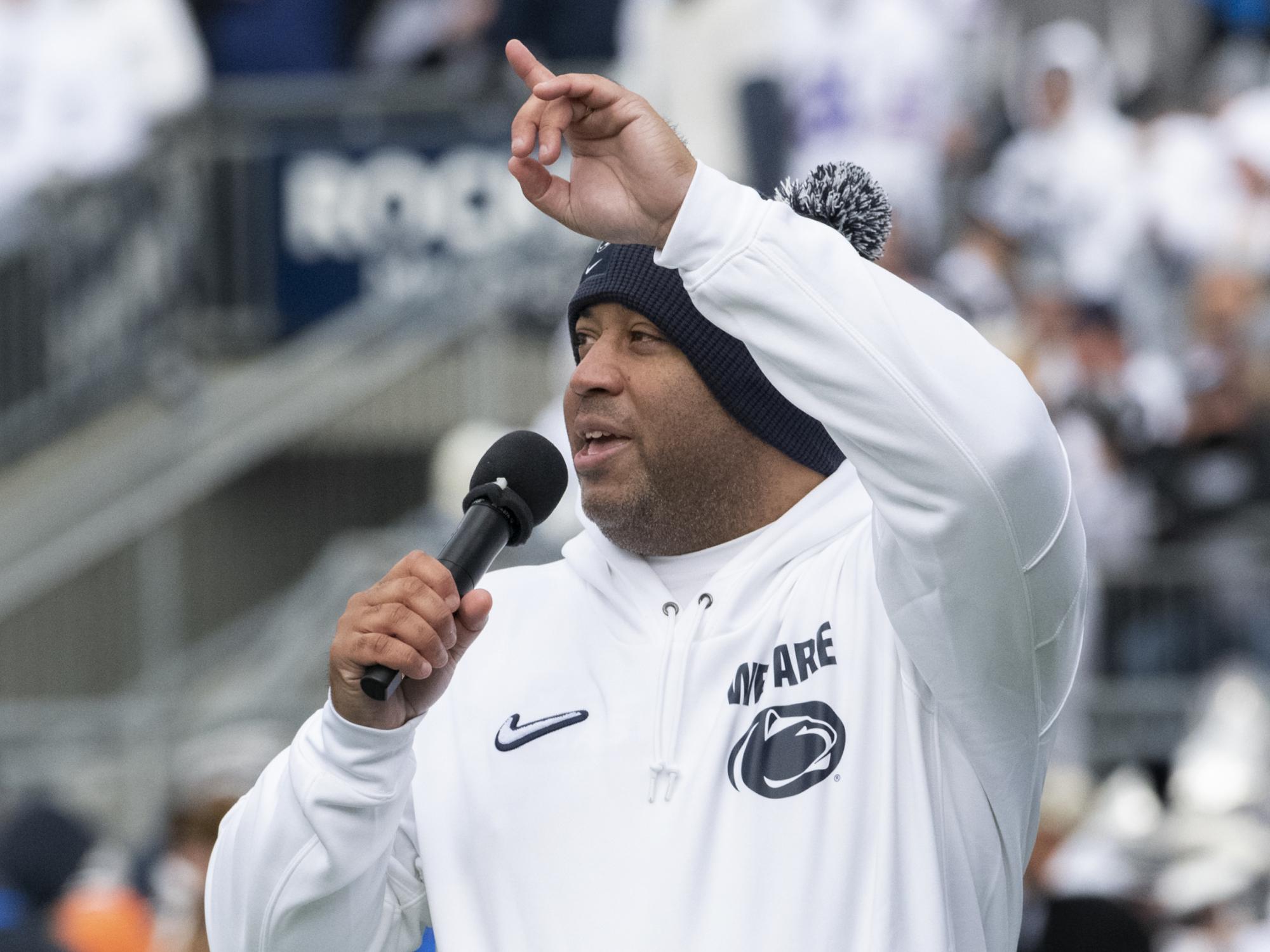 Micah Shrewsberry at football game