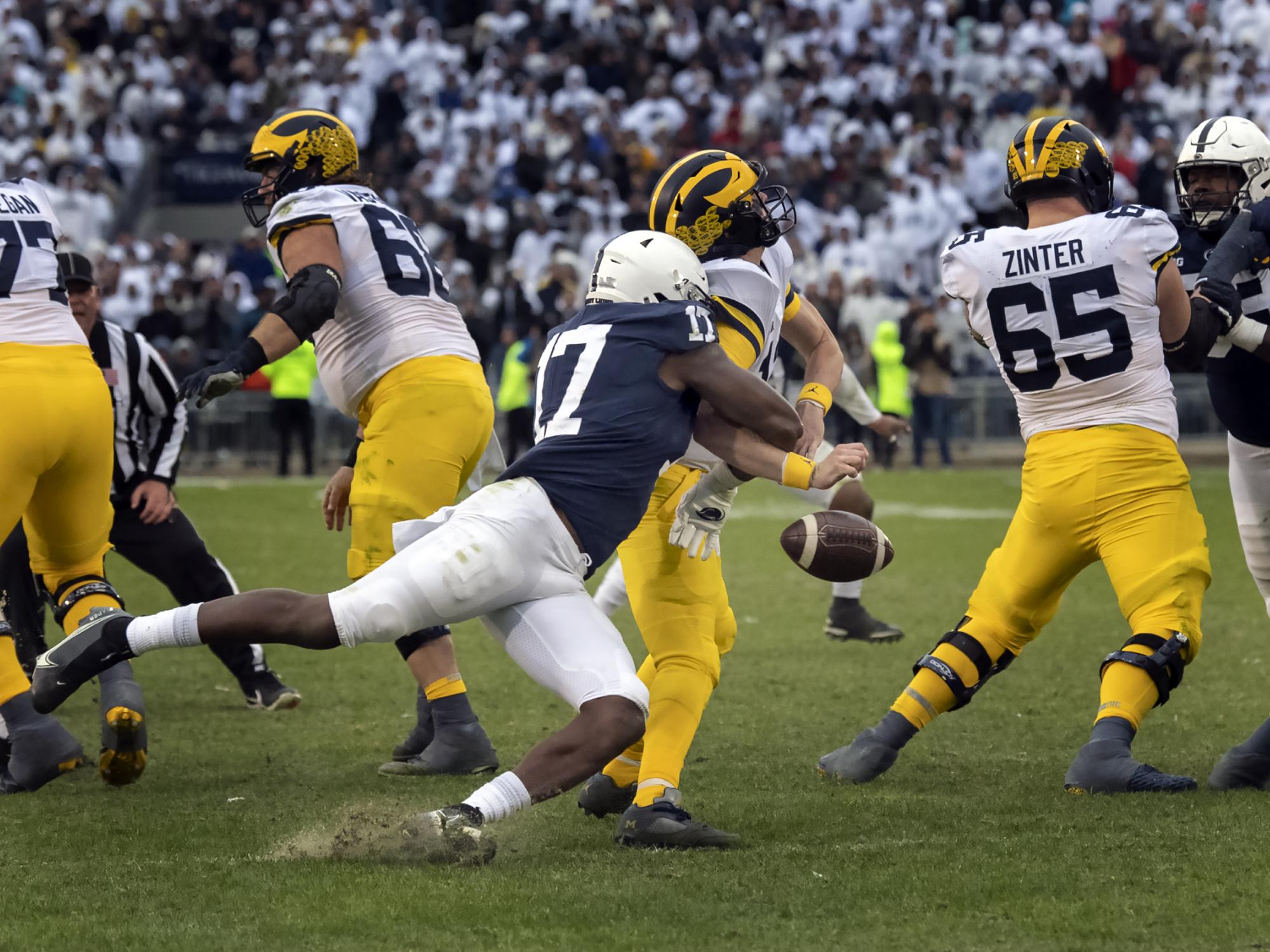 Ebiketie forces a Michigan fumble