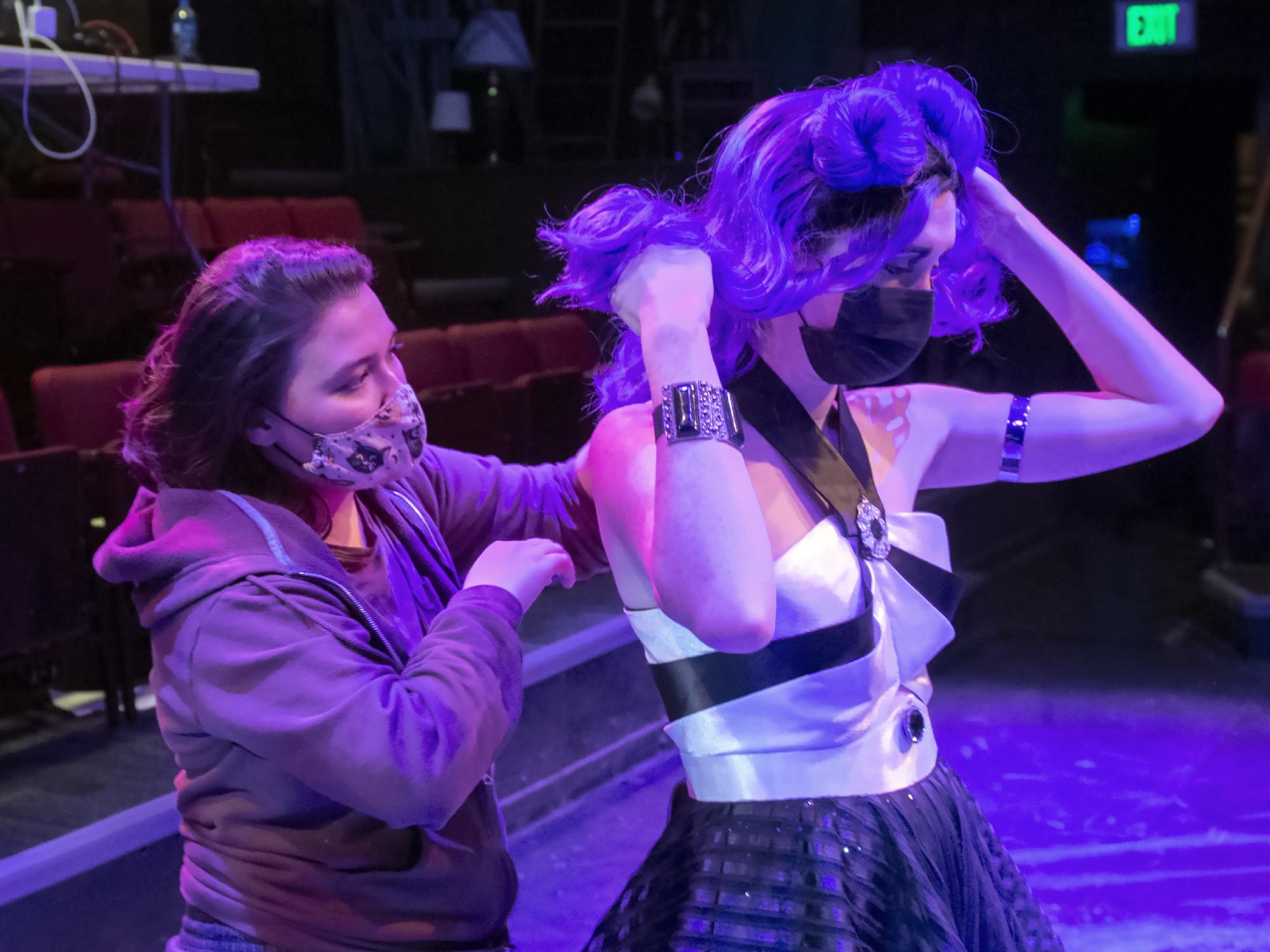 costume designer helps actor