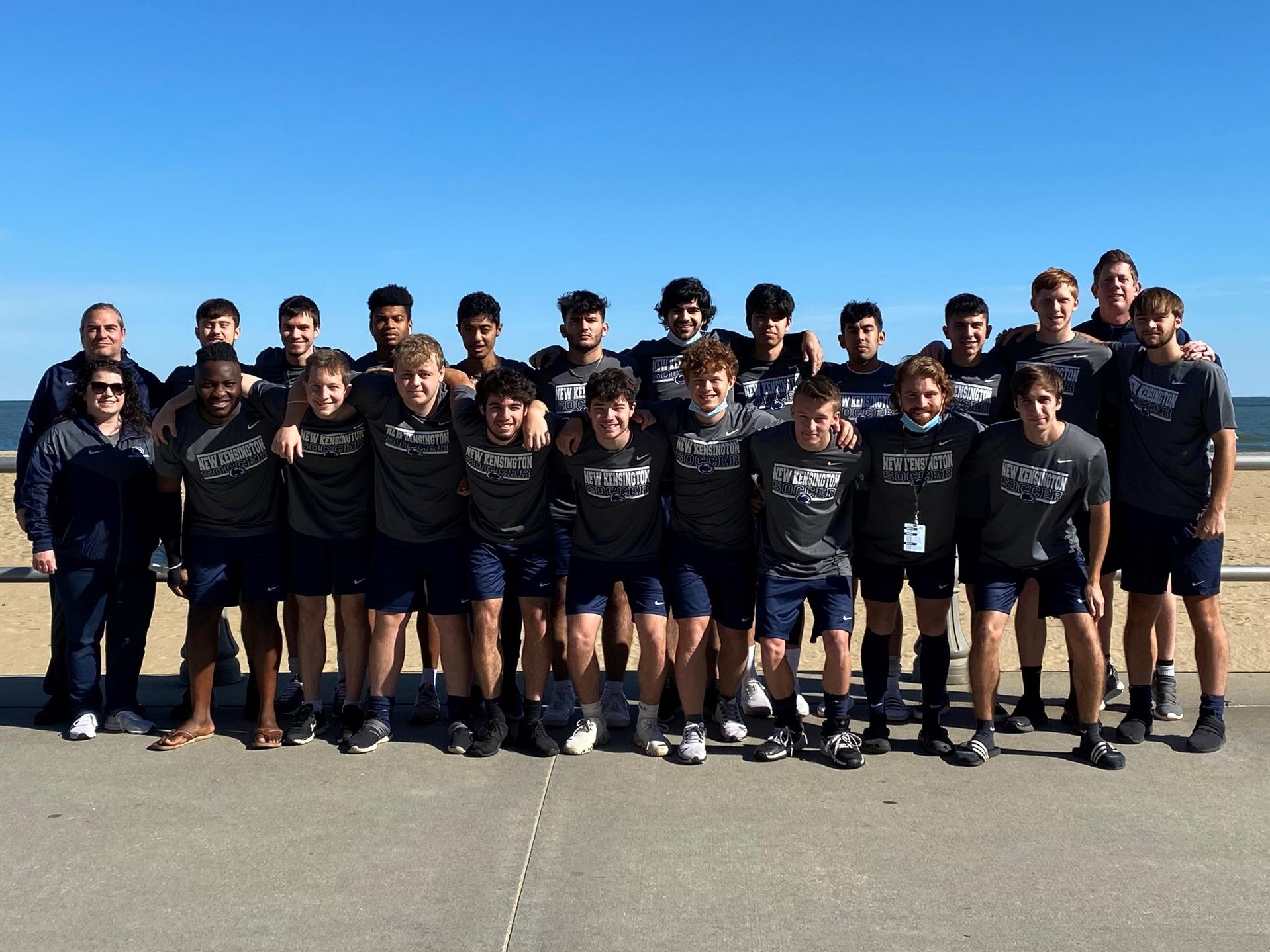 Team group photo on beach