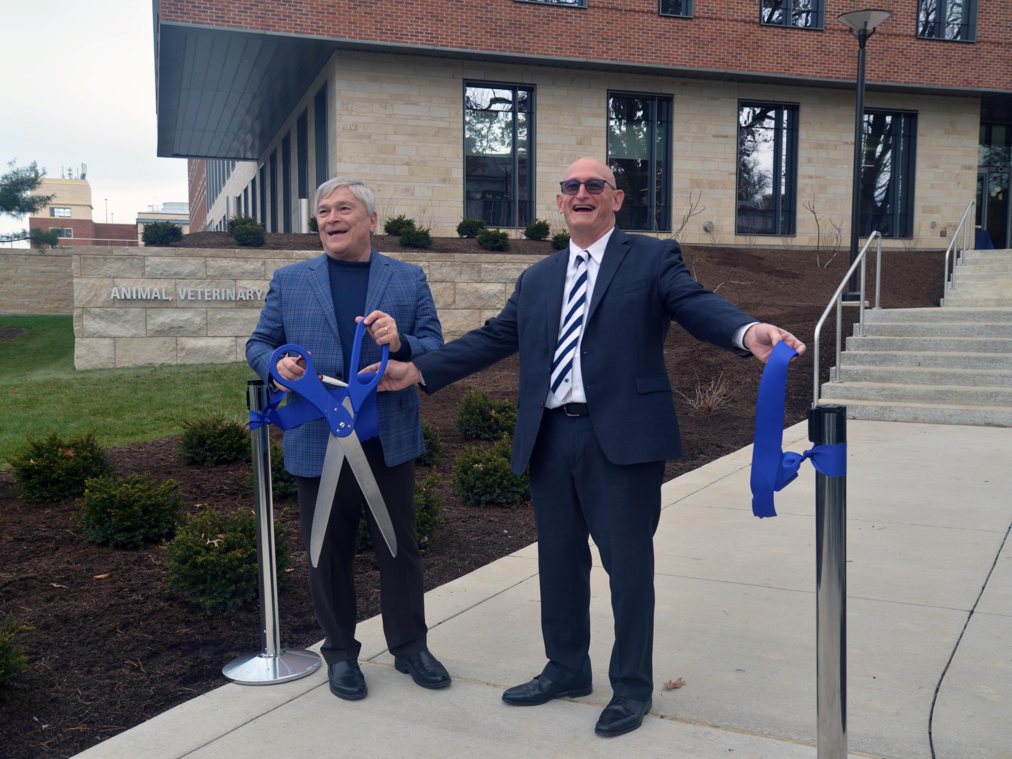 President Barron and Dean Roush unveil the new building