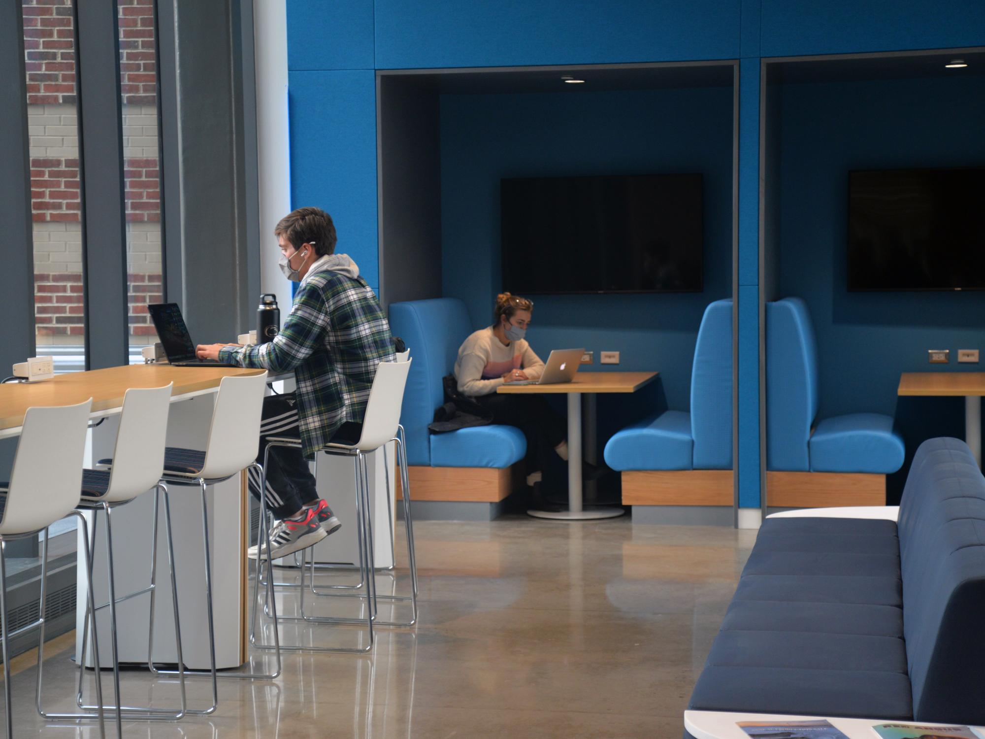 A photo of two students sitting in a collaborative space on the University Park campus