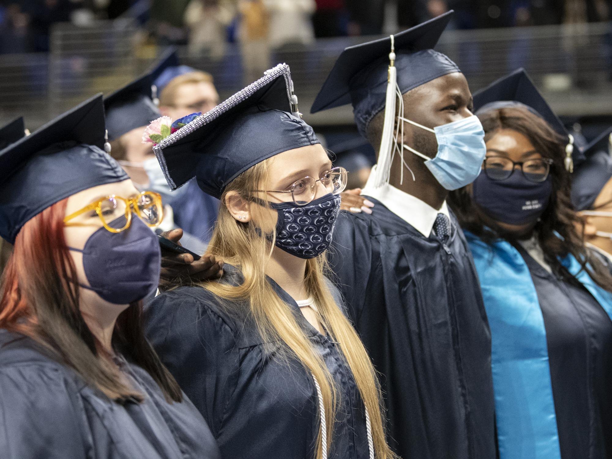 graduates sing the alma mater