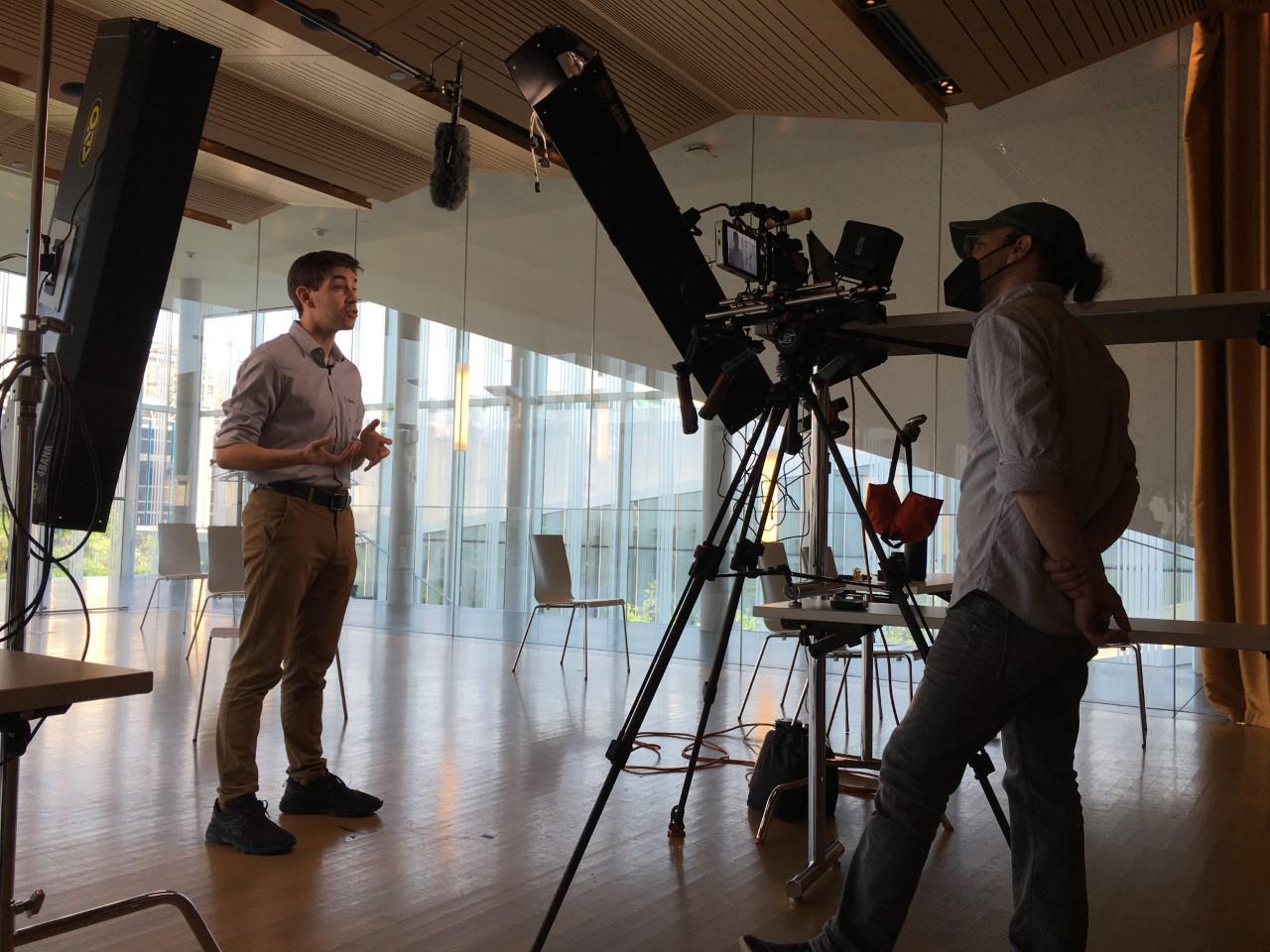 man being interviewed in studio