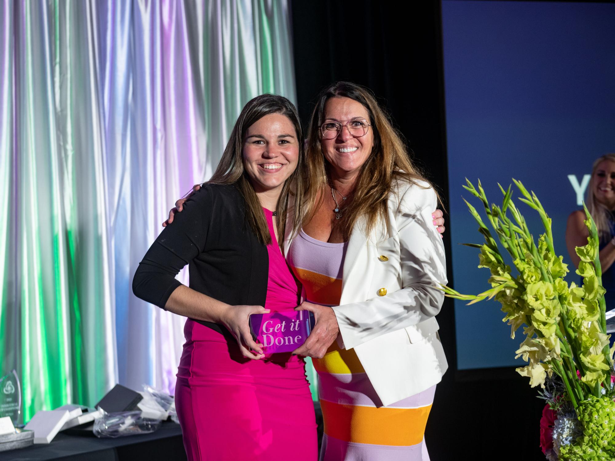 Alyssa Abbonizio and Title Alliance General Counsel and Compliance Officer Maria Deligiorgis.