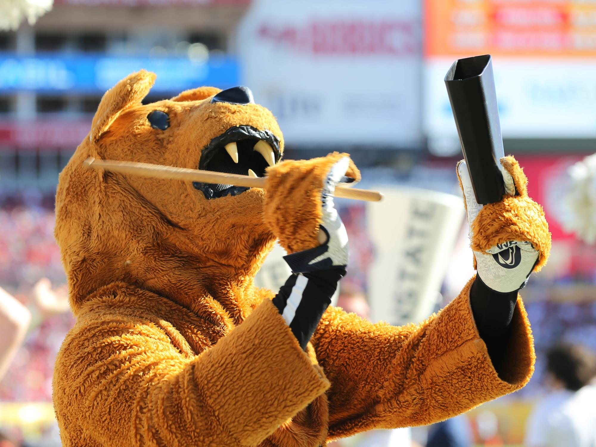 Nittany LIon with Cow bell