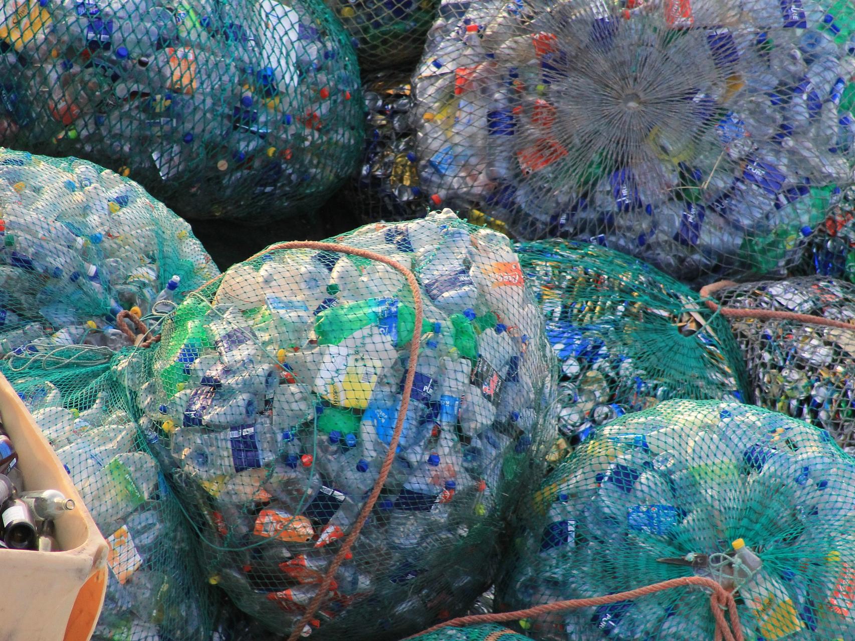 Piled bags full of empty plastic bottles