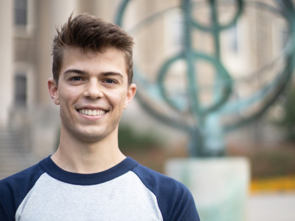 Nolan Marett in front of Old Main