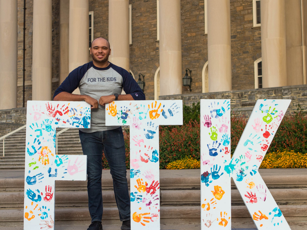 Tyler Saiers in front of Old Main