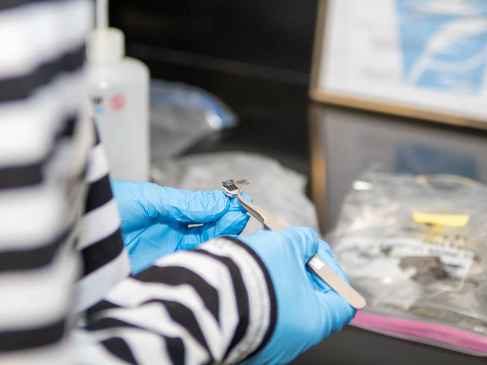 Student prepares mask sample for SEM 