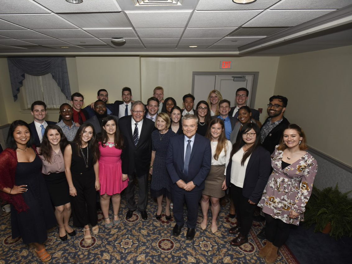 Penn State President Eric J. Barron, center right, stands alongside graduating members of the 2016 class of the Presidential Leadership Academy (PLA), along with alumni and longtime Penn State supporters Edward and Helen Hintz, center, who provided the gift that founded the PLA.